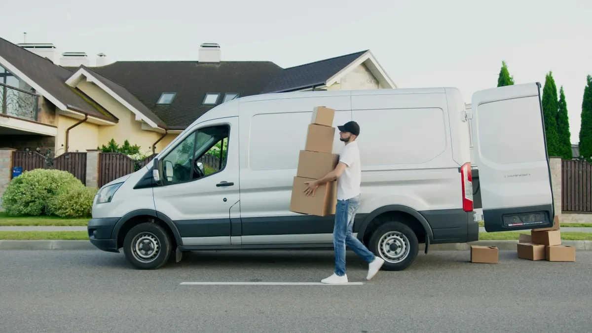 White van parked outside a house