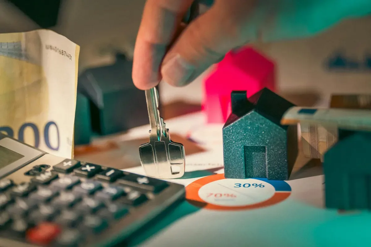 Person comparing household bills and moving costs