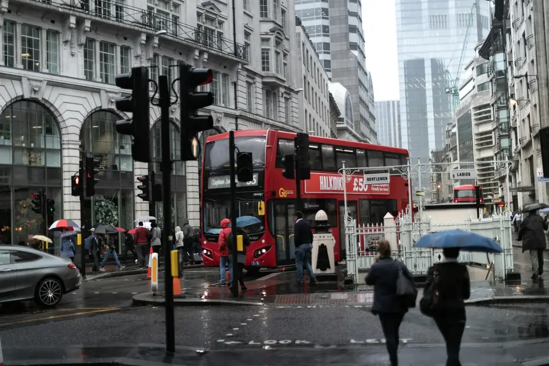 London street with a red double-decker bus