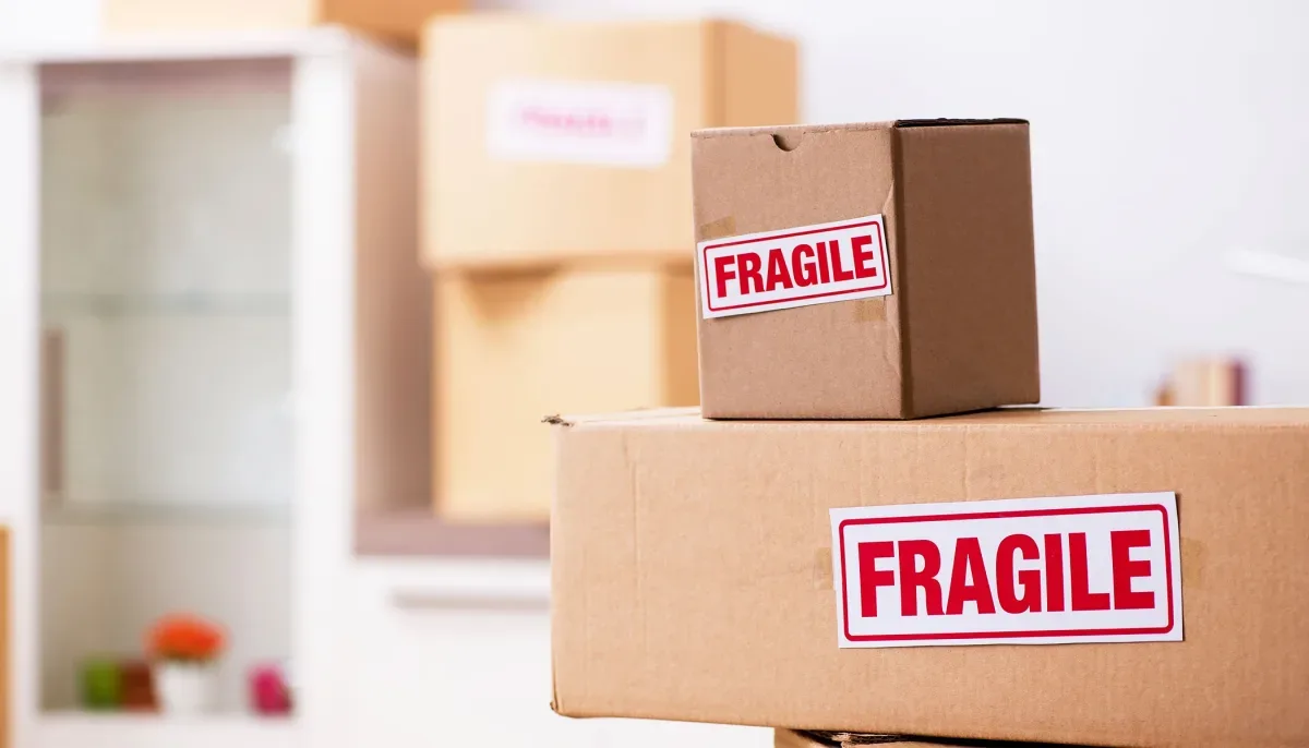 Cardboard packing boxes marked fragile